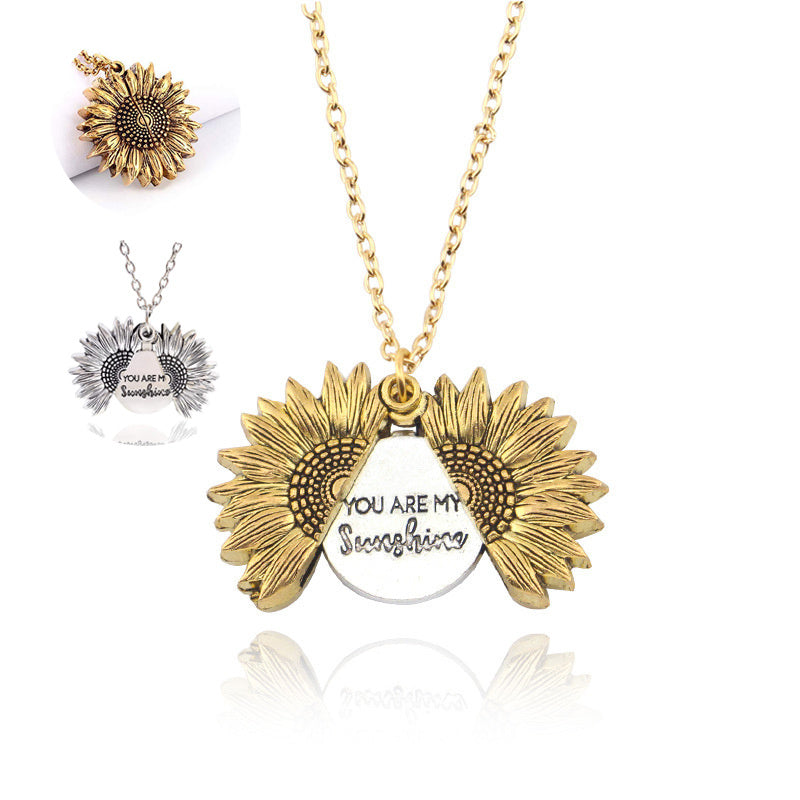 golden you are my sunshine sunflower locket close-up with petals | Oria Jewel