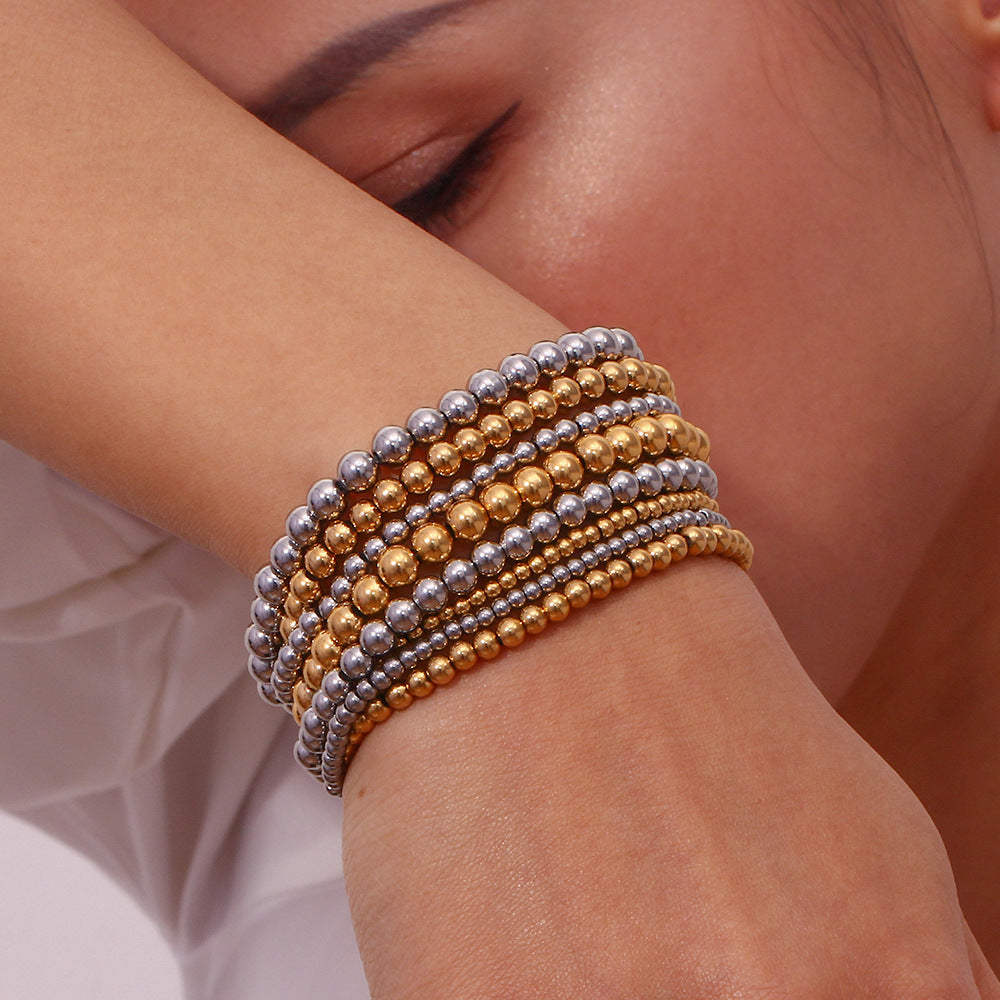 stainless gold stretch bracelet with free pouch