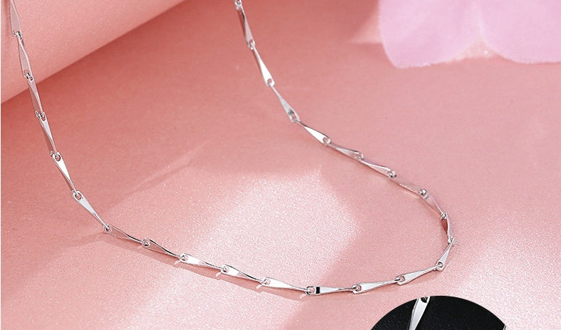 minimalist silver circle chain necklace with soft lighting | Oria Jewel