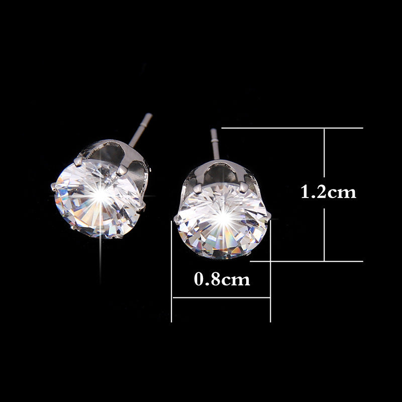 Two sparkling Classic Crystal Elegance Jewelry Set stud earrings on black | Oria Jewel