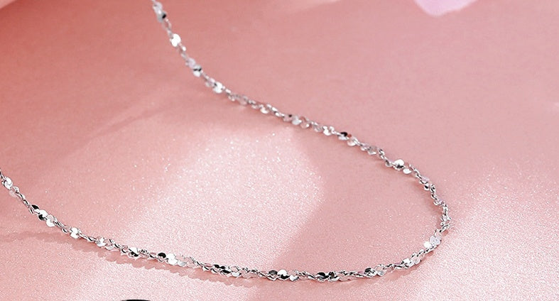 minimalist silver circle chain necklace with soft lighting | Oria Jewel