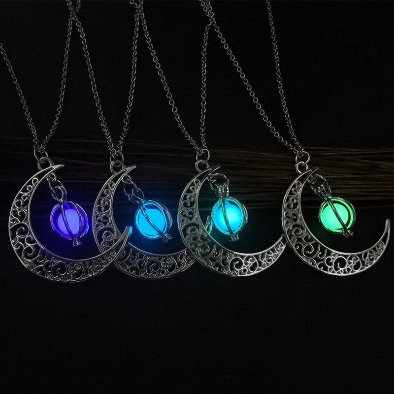 Silver glowing moon locket necklace glowing softly in the dark | Oria Jewel