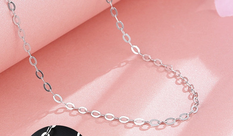 minimalist silver circle chain necklace with soft lighting | Oria Jewel