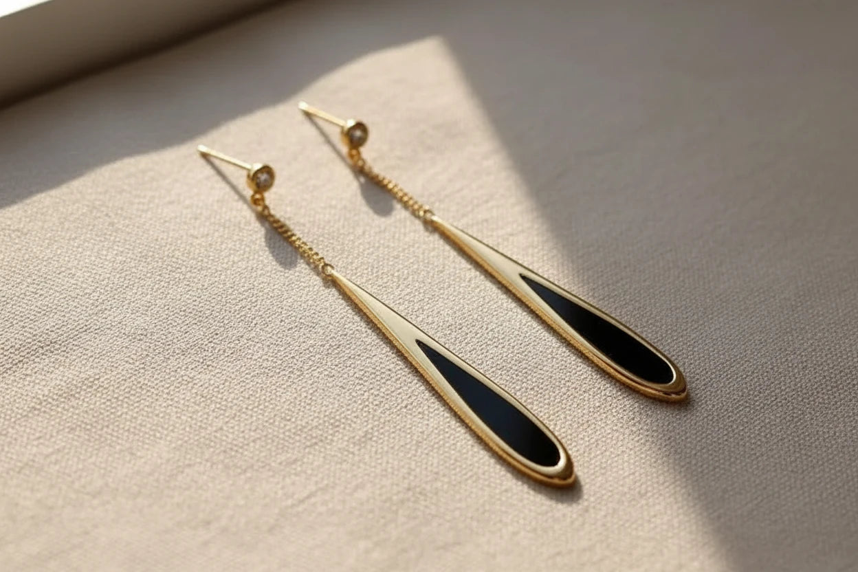 Black Teardrop Chain Drop Earrings on gold stand with window shadow | OriaJewel