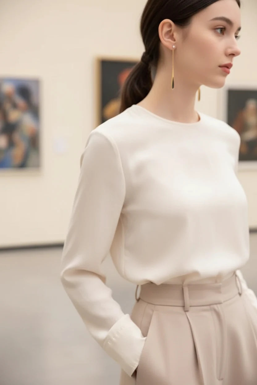 Black Teardrop Chain Drop Earrings worn in gallery outfit side view | OriaJewel