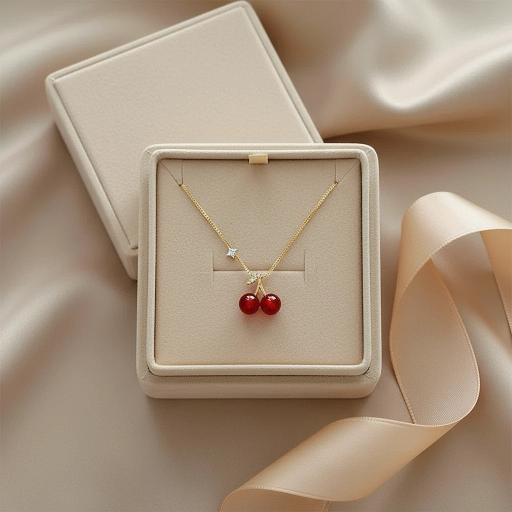 Cherry Pendant Necklace presented in beige jewelry box with satin ribbon, highlighting elegant packaging and design | Oria Jewel