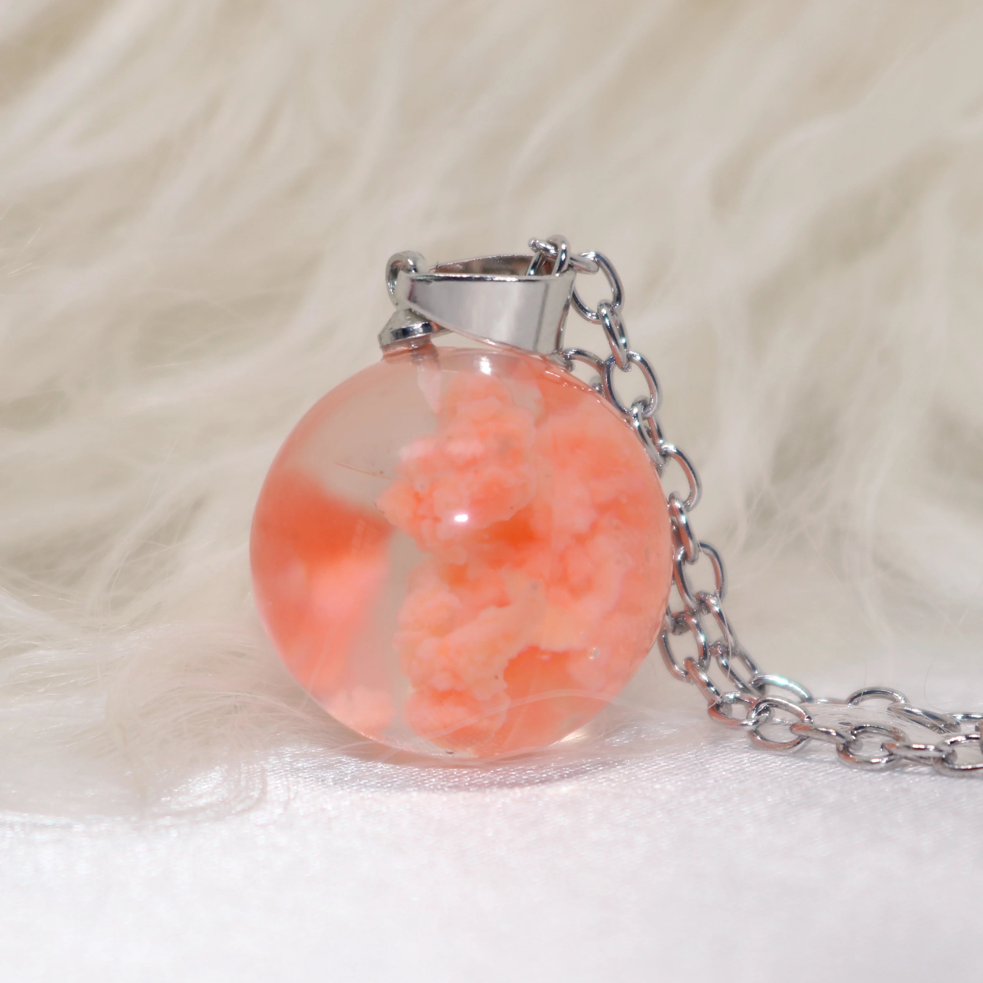 Elegant close-up of translucent cloud resin necklace | Oria Jewel