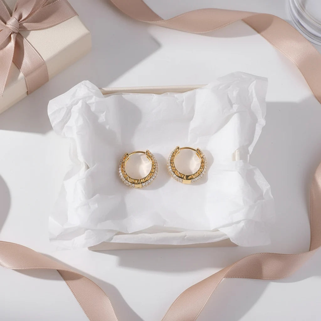 Gold Pavé Huggie Hoop Earrings gift box flat lay with ribbon | OriaJewel