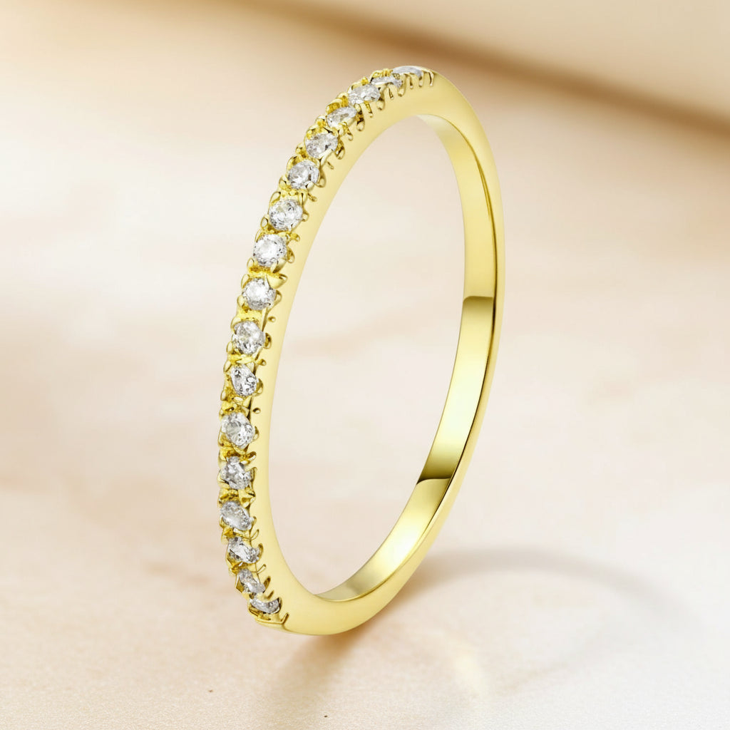 Radiant gold Sparkle Stacking Ring Set, brilliant diamonds, upright on light surface | Oria Jewel