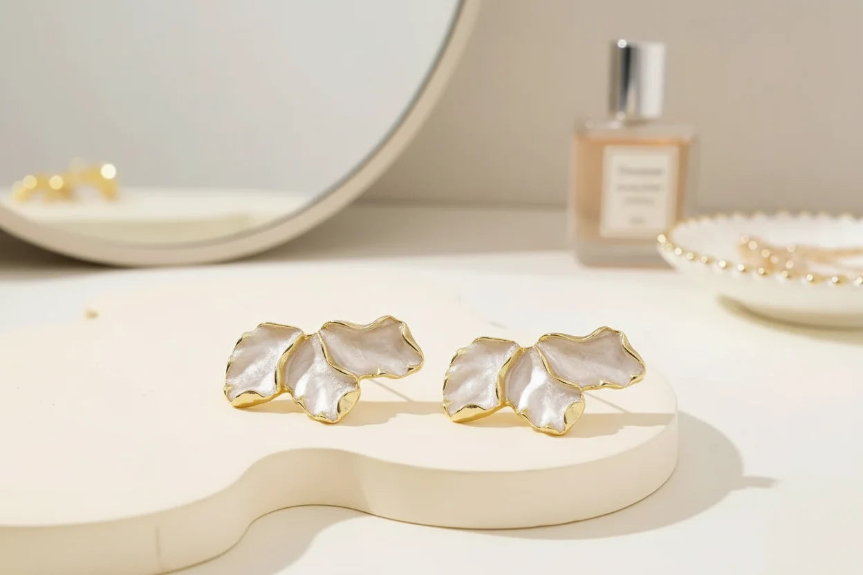 Pearl Petal Statement Stud Earrings vanity flat lay with mirror | OriaJewel