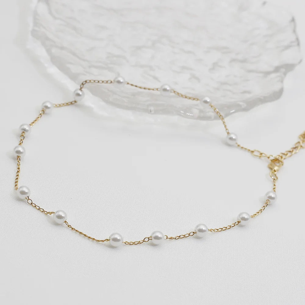 Stainless Kpop pearl chokers layered with minimalist silver chains | Oria Jewel