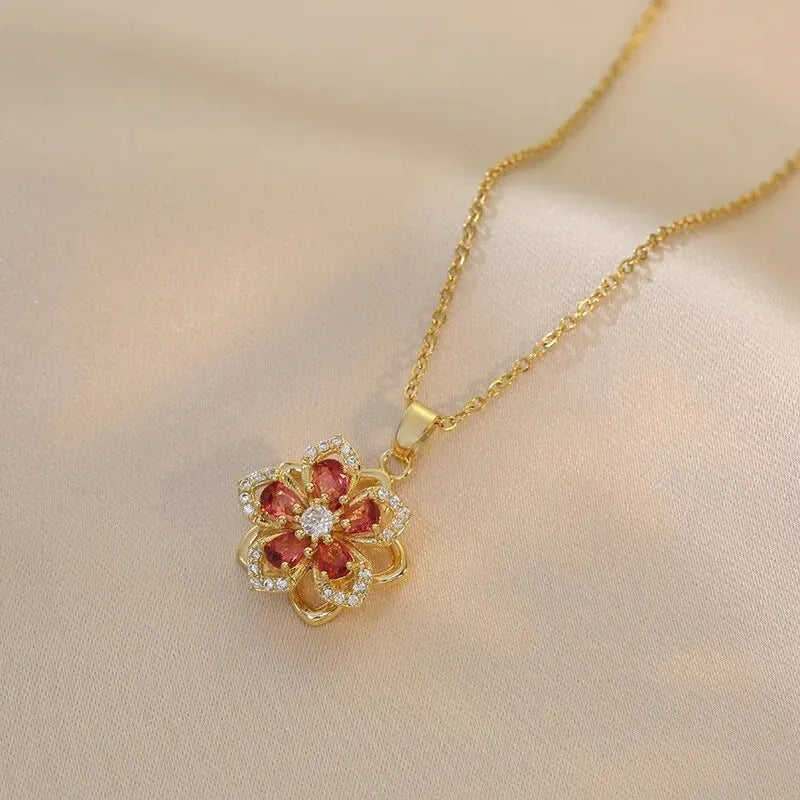 Elegant gold pendant rose flower necklace on soft beige background | Oria Jewel