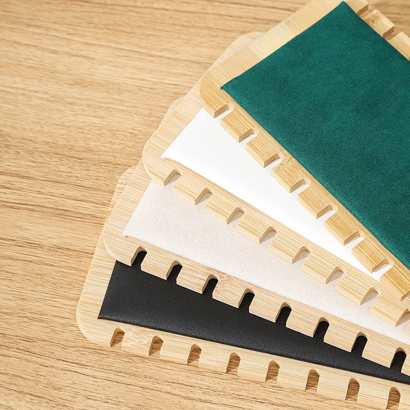 Wooden Necklace Holder Display with various colored felt surfaces for organized jewelry storage.