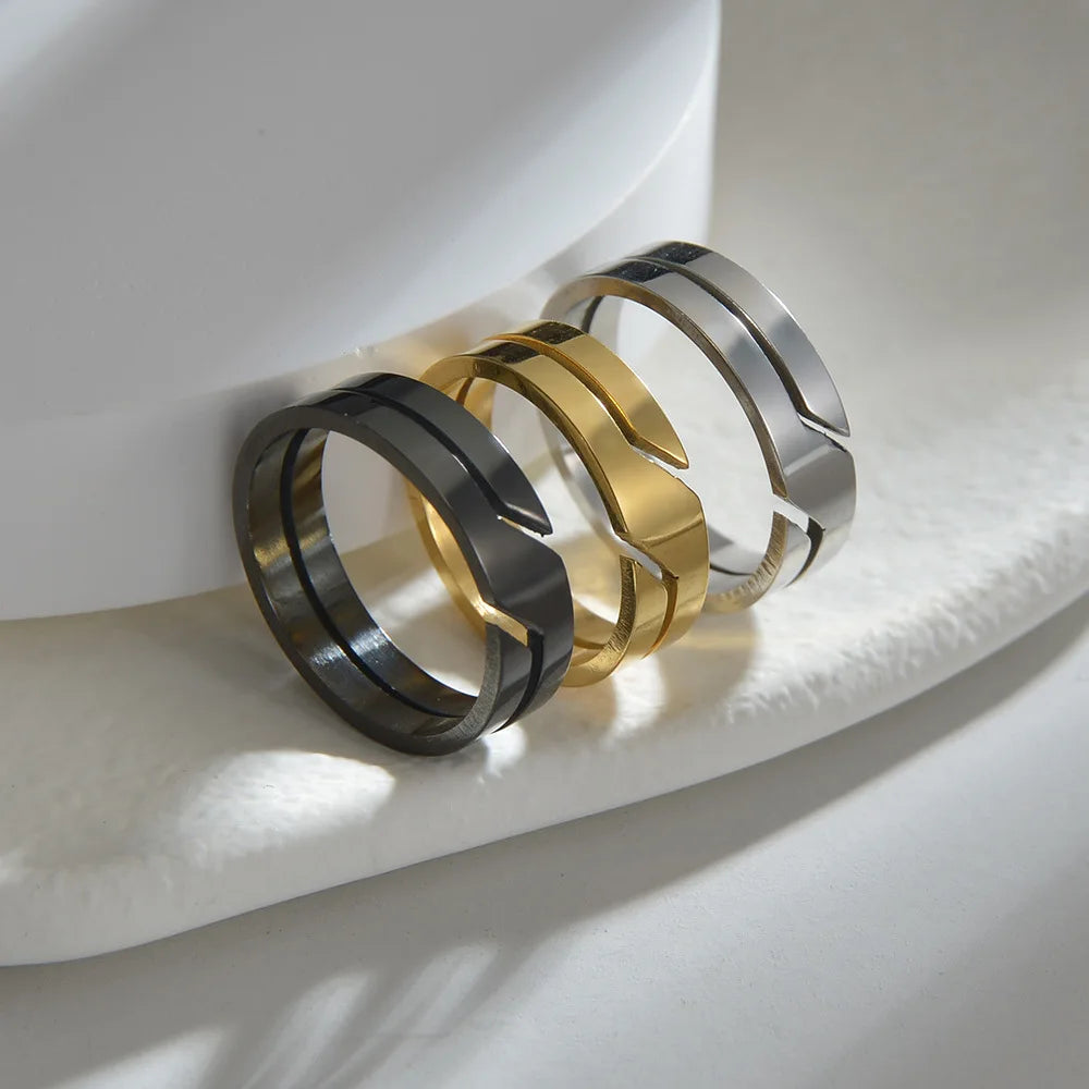 Close-up: A Geometric Gold Band Ring with black and silver bands on white | Oria Jewel