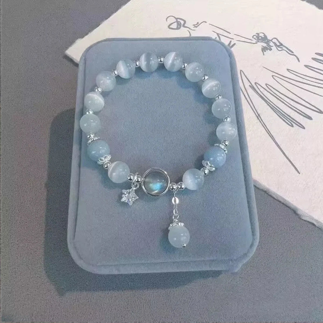 adjustable blue moonstone armband bracelet on wrist