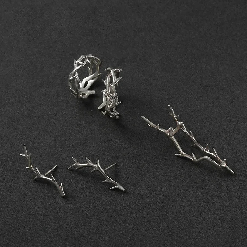Elegant sterling silver vine ring and matching branch jewelry on a dark background | Oria Jewel