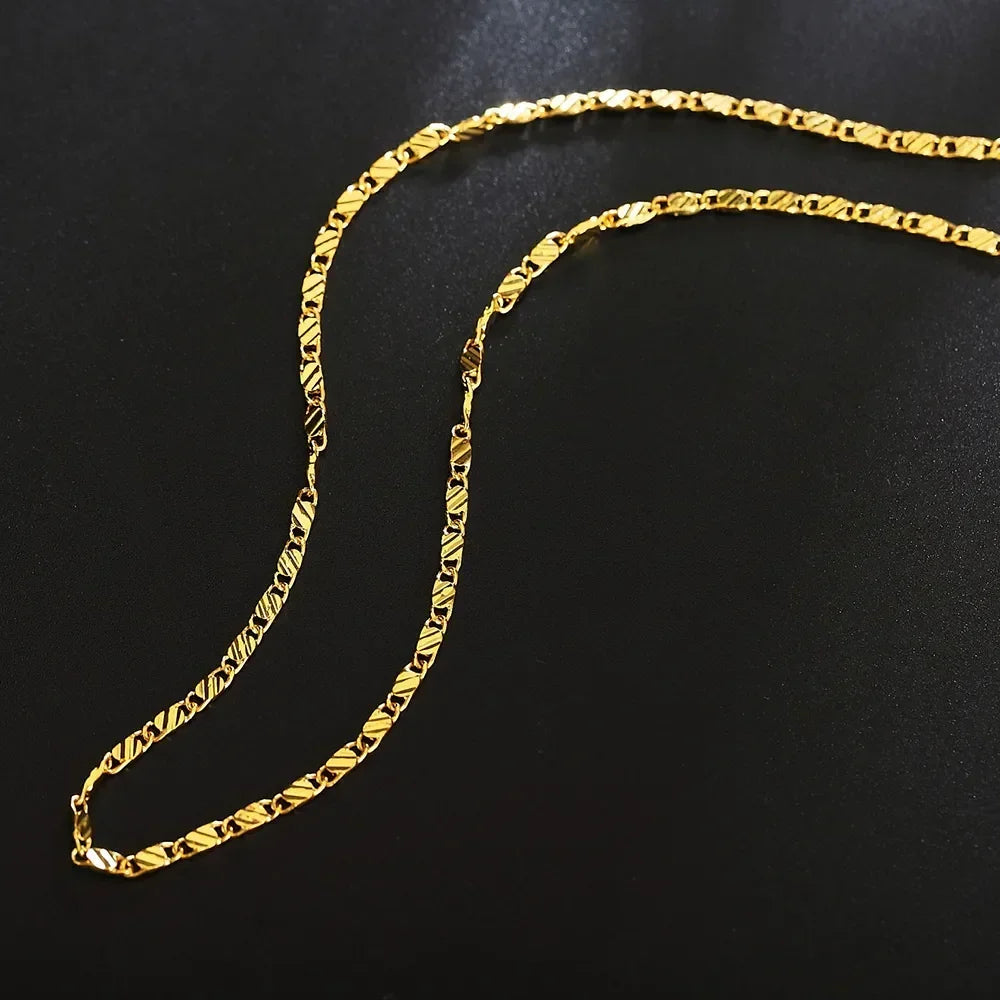 Elegant flat chain choker with sleek, polished gold shine | Oria Jewel