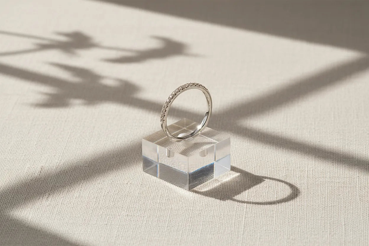 Silver Midi Ring Set displayed upright on a clear stand with window-light shadows, clean minimal product presentation | OriaJewel