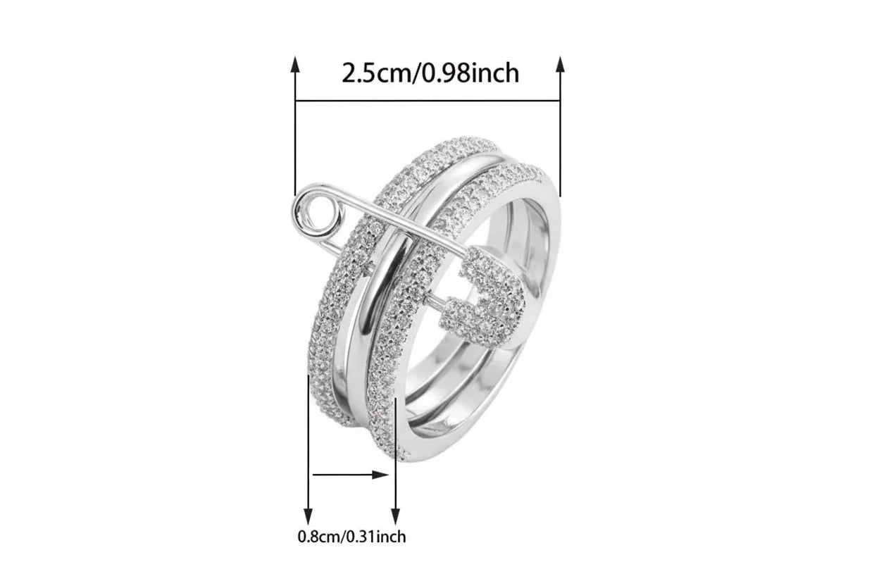 Silver Safety Pin Ring size guide showing pavé triple-band design with safety pin bar and crystal heart detail, labeled 2.5cm length and 0.8cm width measurements | OriaJewel