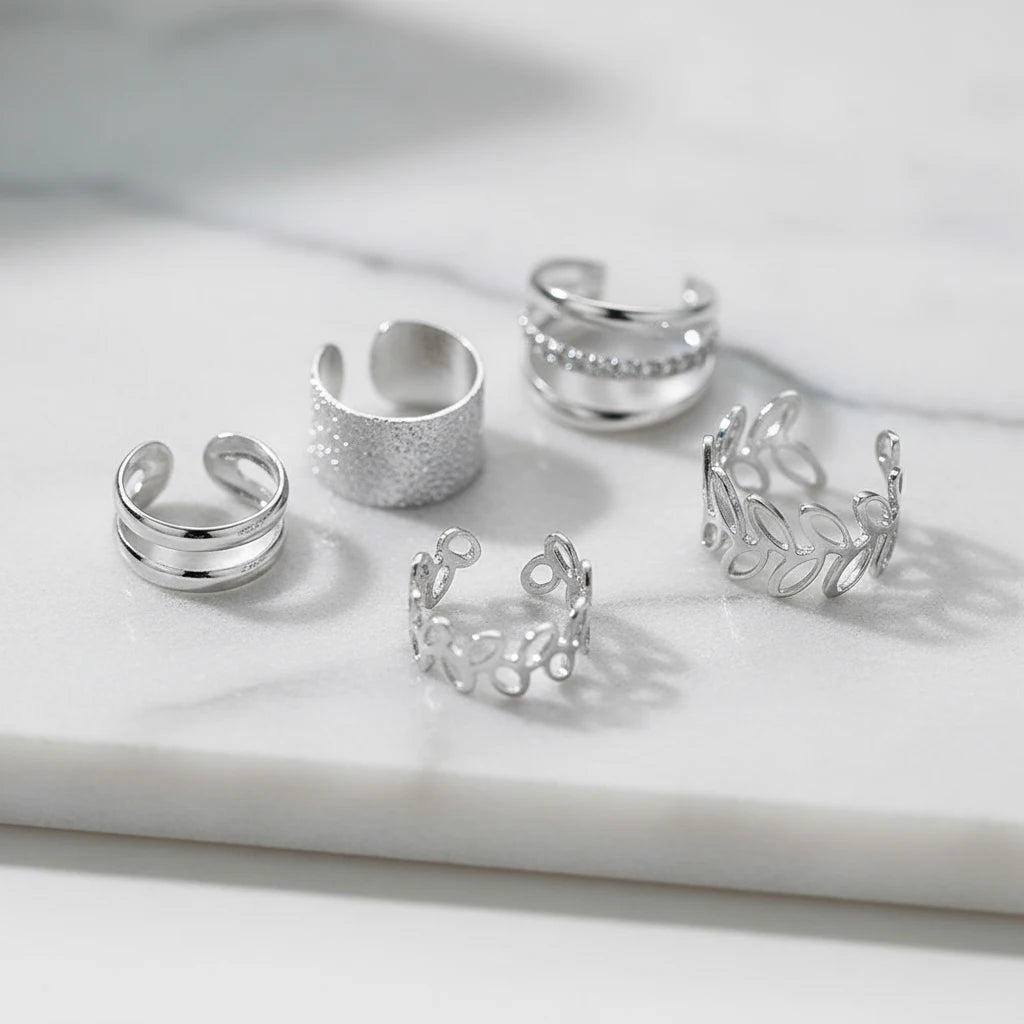 Silver 5-Piece Ear Cuff Set on marble surface close-up | OriaJewel