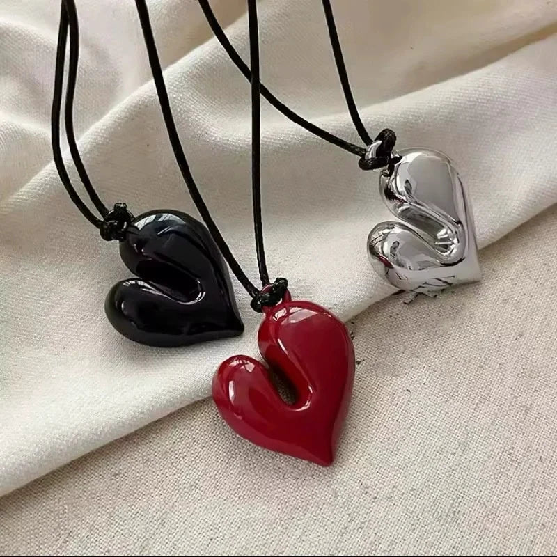 Simple Heart Pendant Necklace featuring black, red, and silver heart-shaped pendants on black cords | Oria Jewel