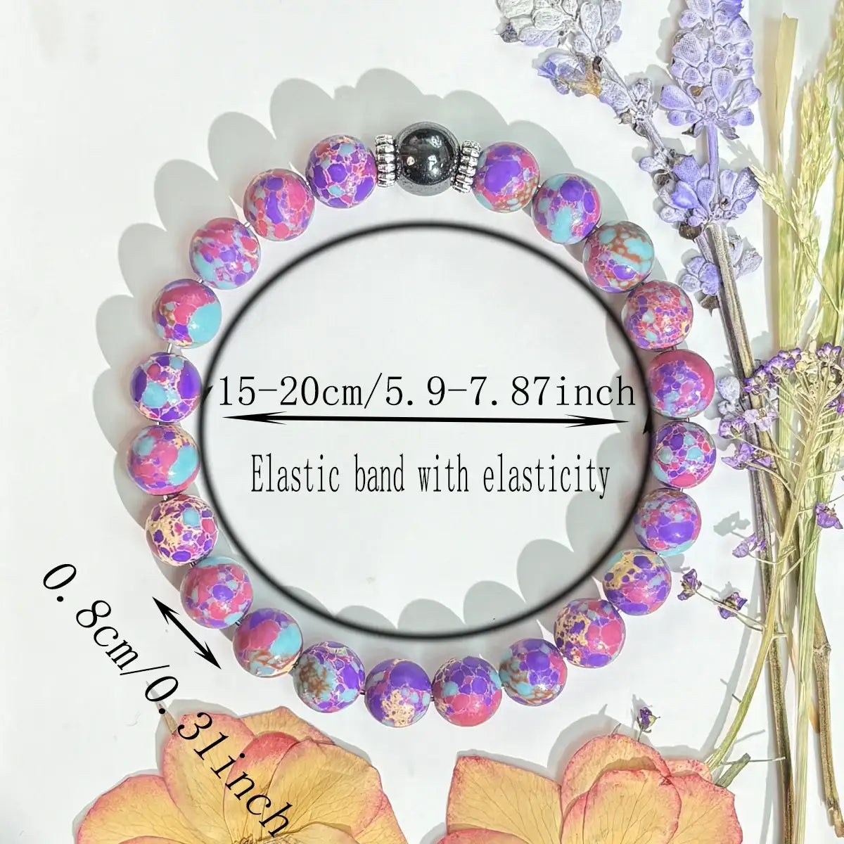 Size chart showing the Stretch-fit Stress Relief Gemstone Bracelet with purple beads and floral decoration around it | Oria Jewel