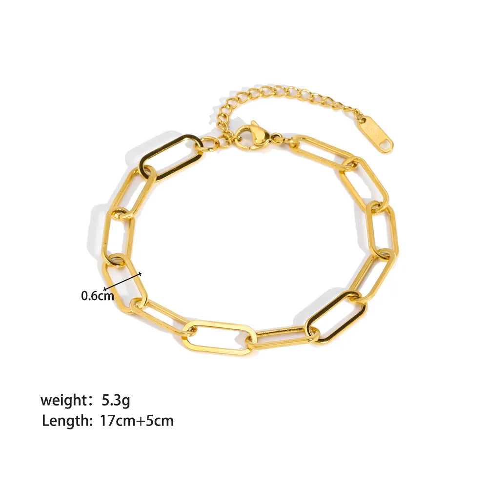 Product image of adjustable gold paperclip chain bracelet showing link width, weight and length on a clean white background | Oria Jewel