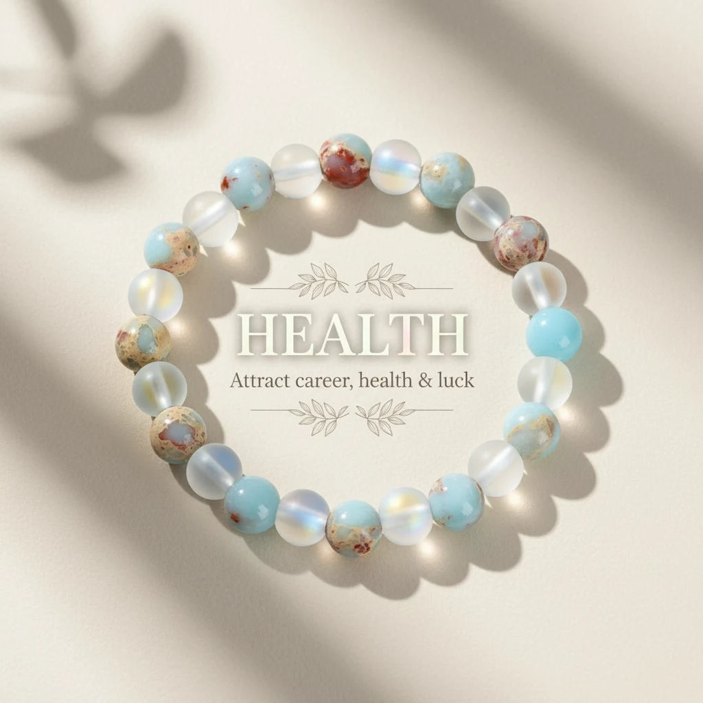 Flat-lay of the Luck & Health Stone Bracelet framing the word โHEALTH โ Attract career, health & luck,โ styled on a soft beige background | Oria Jewel