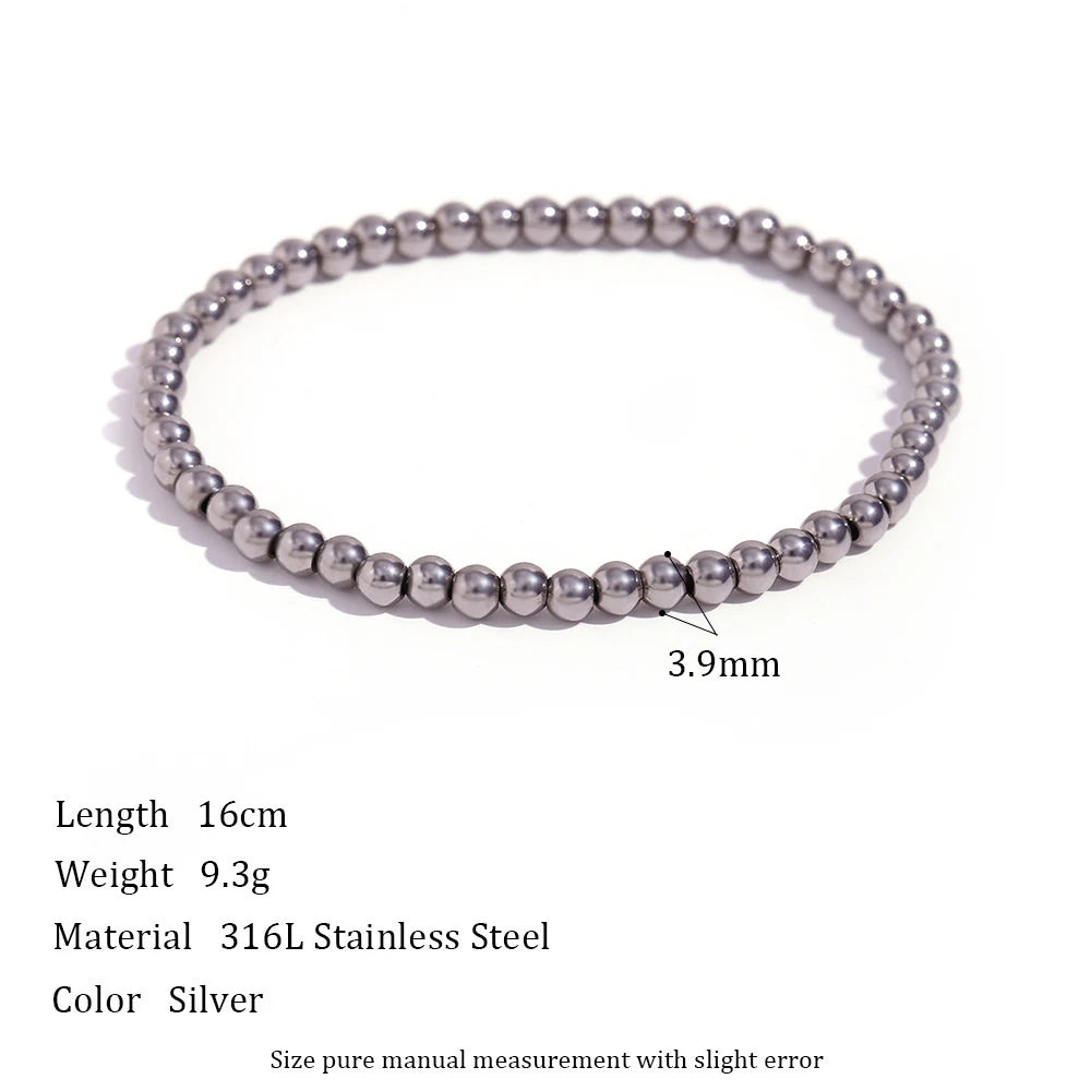Medium 3.9mm Silver Beaded Stretch Bracelet lying flat on a white background with size and weight text, showing evenly spaced round beads for everyday stacking | Oria Jewel
