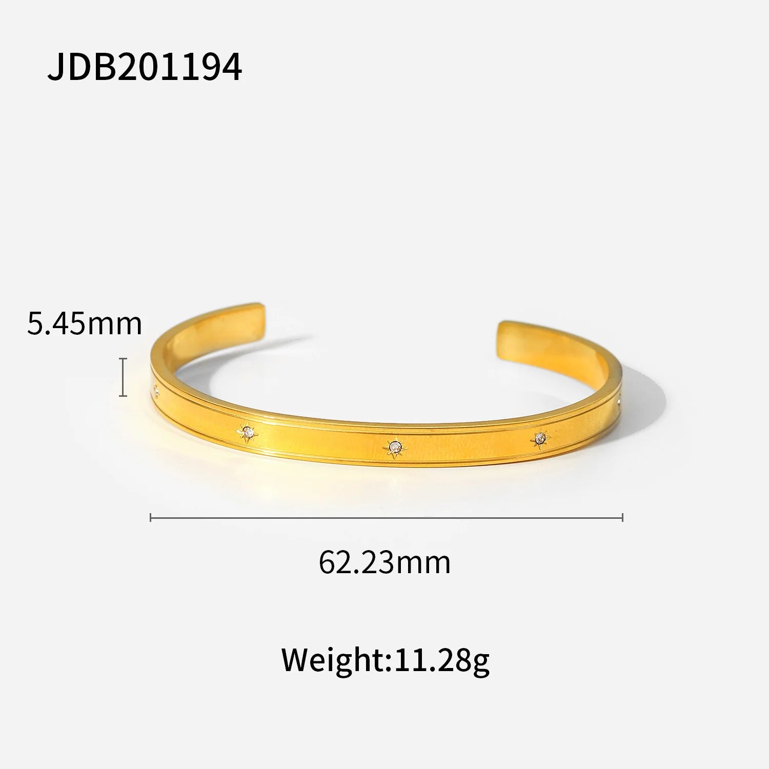 Product diagram of a gold statement cuff bracelet on a white background showing 5.45 mm band width, 62.23 mm inner diameter and weight of 11.28 g for sizing reference | Oria Jewel