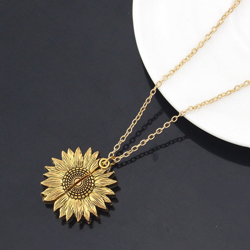 golden you are my sunshine sunflower locket close-up with petals | Oria Jewel