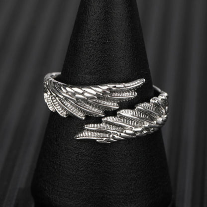 Close-up: detailed silver Angel Bat Wrap Ring displayed on a black stand | Oria Jewel