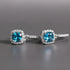 Aqua Blue Drop Huggie Earrings macro close-up on gray background showing blue stones | OriaJewel