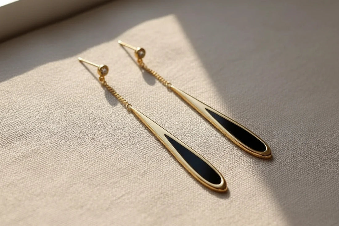 Black Teardrop Chain Drop Earrings on gold stand with window shadow | OriaJewel