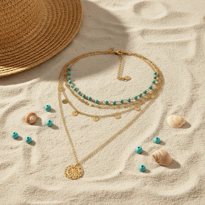 Boho Pendant Necklace Set on sand with seashells and turquoise beads — beach-inspired boho style | Oria Jewel