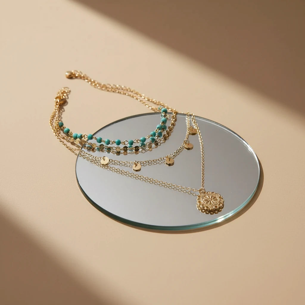 Boho Pendant Necklace Set arranged on a mirror surface under soft natural light — detailed boho craftsmanship | Oria Jewel