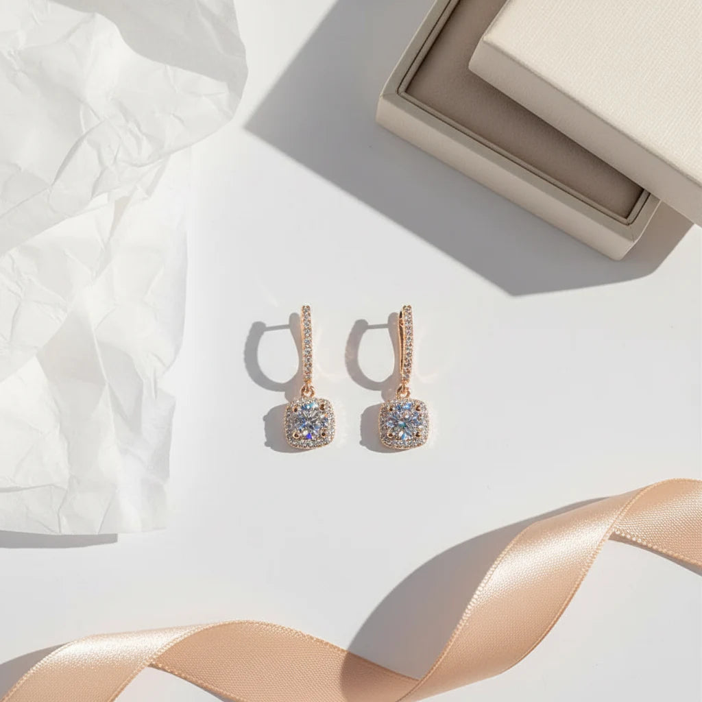 Bronze Crystal Drop Huggie Earrings flat lay with gift box, tissue paper, and satin ribbon | OriaJewel