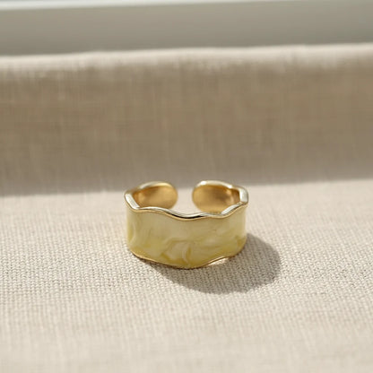 Champagne Marble Open Wave Ring on linen fabric with warm sunlight and soft shadows | OriaJewel