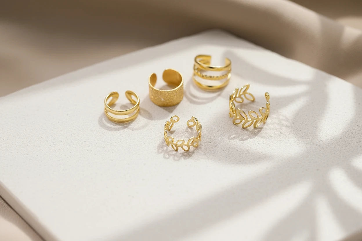 Gold 5-Piece Ear Cuff Set on white tray in soft sunlight | OriaJewel