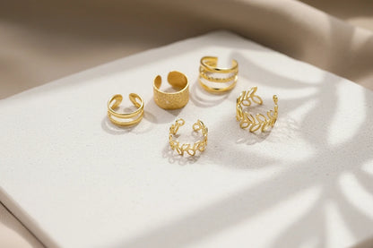 Gold 5-Piece Ear Cuff Set on white tray in soft sunlight | OriaJewel