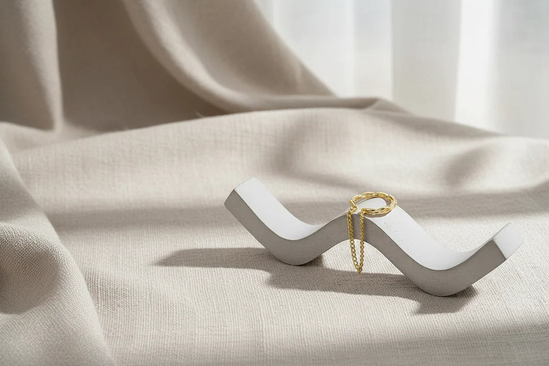 Gold Chain Ear Cuff on white wave stand with dangling chain | OriaJewel