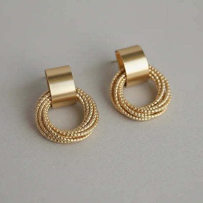 Gold Circle Drop Stud Earrings close-up showing textured ring detail | OriaJewel
