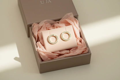 Gold Circle Stud Earrings in gift box with blush tissue flat lay | OriaJewel