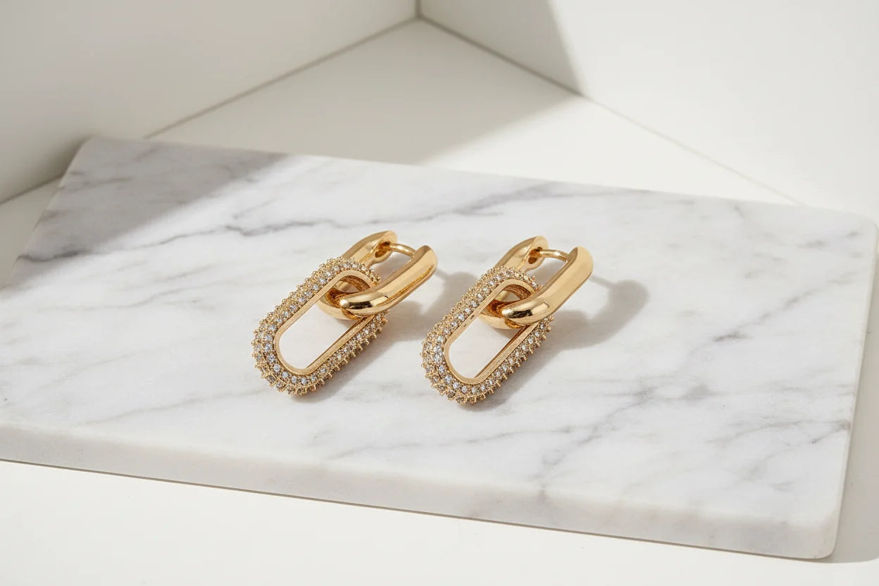 Gold Link Drop Earrings on marble slab in bright natural light | OriaJewel