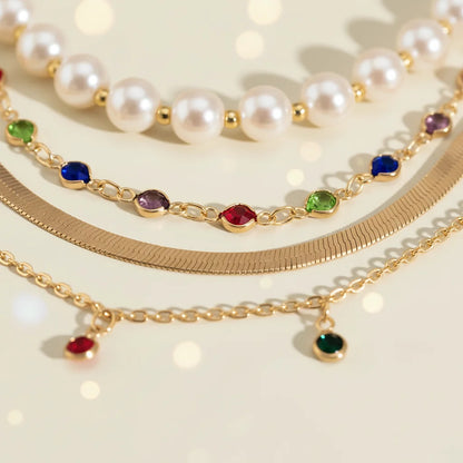 Gold Multilayer Choker Necklace adorned with colorful gemstones and pearls | Oria Jewel