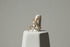 gold Pavé snake wrap ring on a white ring stand with a clean studio background | OriaJewel