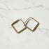 Gold Square Hoop Earrings pair on white marble background | OriaJewel