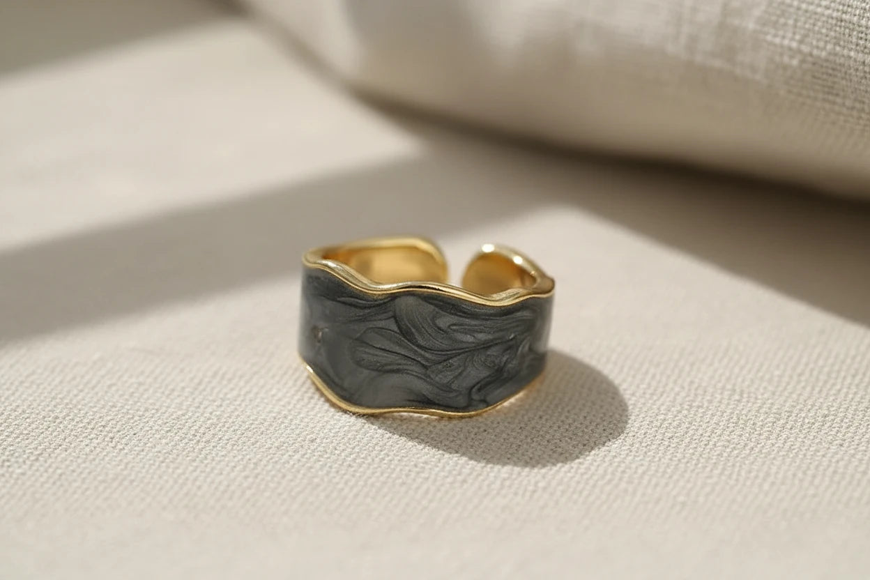 Gray Marble Open Wave Ring close-up on textured linen fabric with soft window shadows | OriaJewel