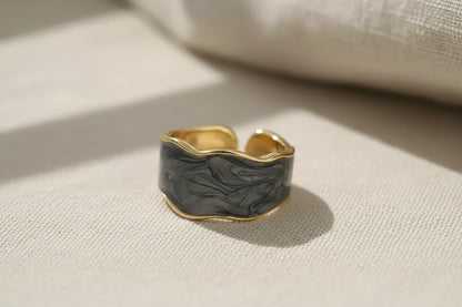 Gray Marble Open Wave Ring close-up on textured linen fabric with soft window shadows | OriaJewel
