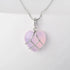 Natural Moonstone Pendant with silver heart cage on white background | Oria Jewel